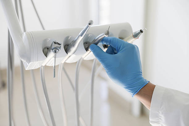 Professional Invisalign Clear Aligners technician working in Coopertown, TN